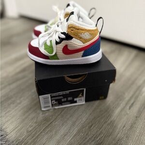 Nike Kids Sneakers in Red, Green, Blue, and Gold